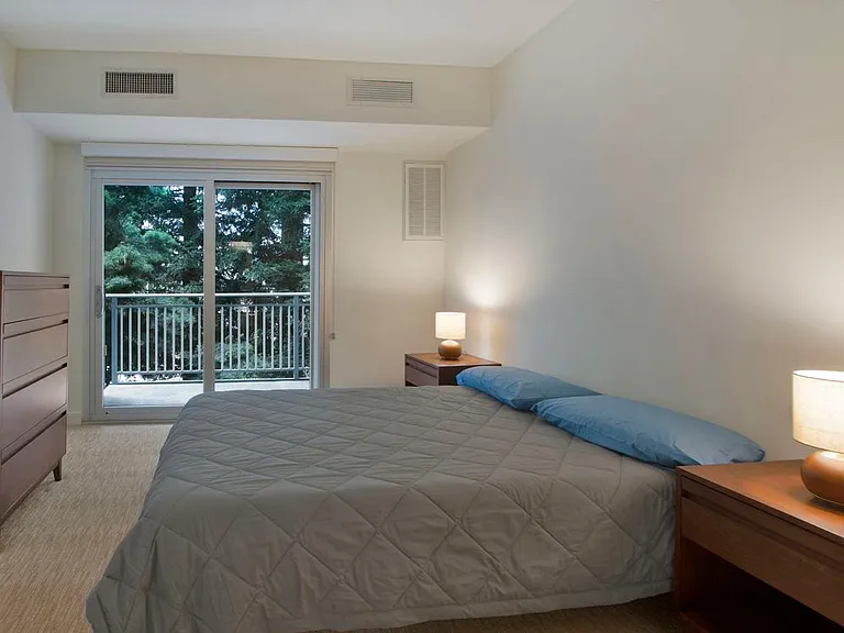 Furnished+ apartment homes feature queen bed with mattress, dresser, nightstands, and lamps (Representative Image exact items and style of furnishings may vary, comforter and pillows are not included)