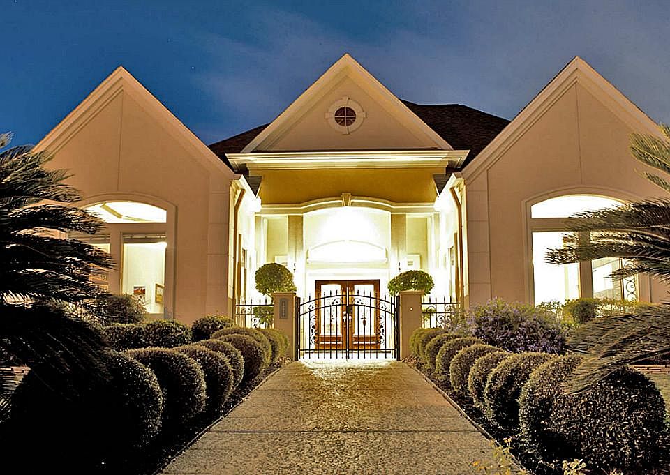 Evening view with lush landscaping