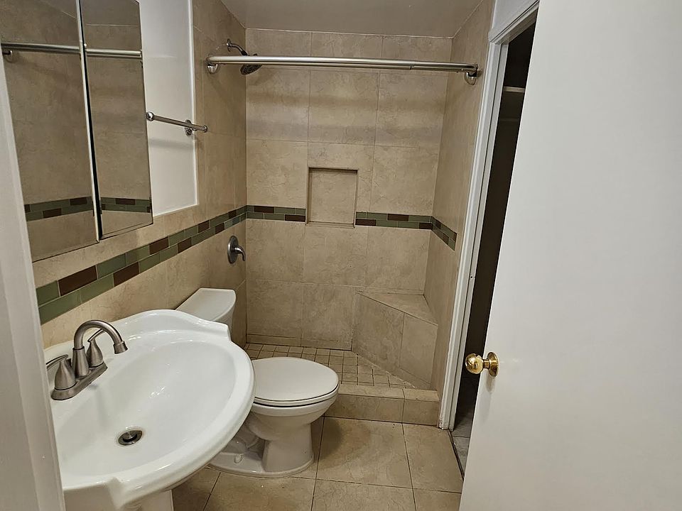 Porcelain Tile shower with corner seat