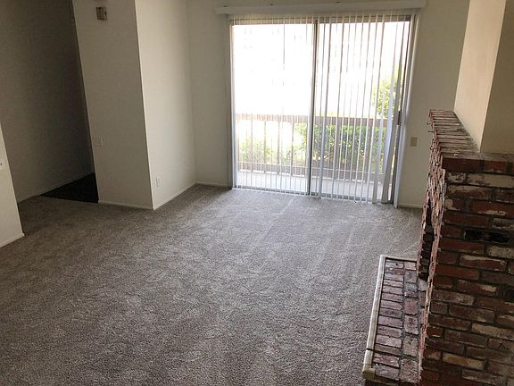 Living room with decorative fireplace