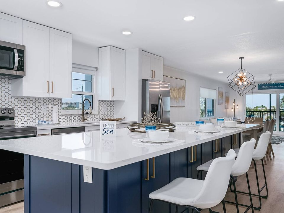 Kitchen opens to LR/DR Combo that leads out to the Lanai.