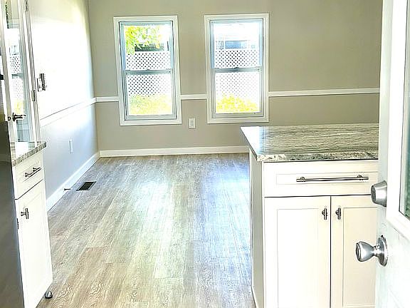 Kitchen looking onto living 