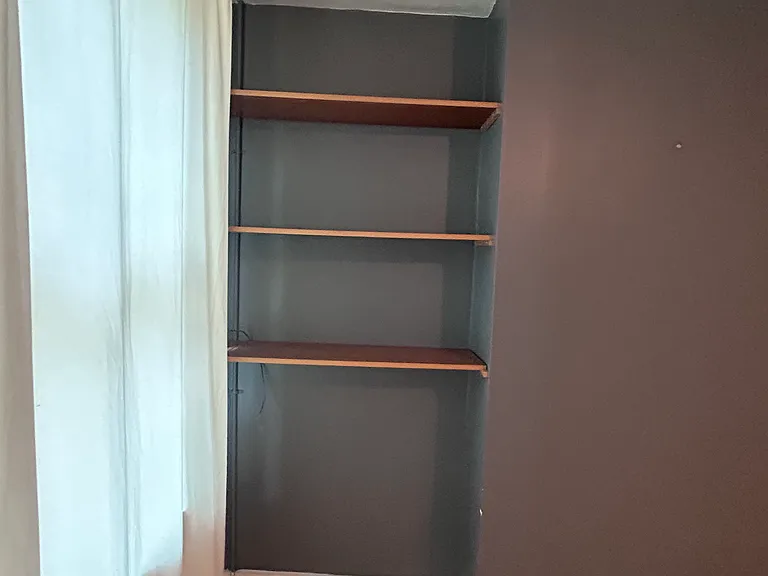 Shelving in nook in front room.