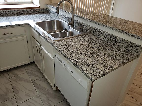 Beautiful 40/60 stainless steel sink and modern faucet