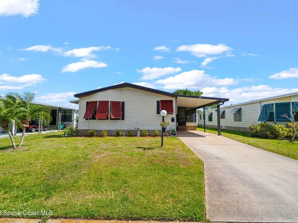 706 Hyacinth Cir, Barefoot Bay, FL 32976