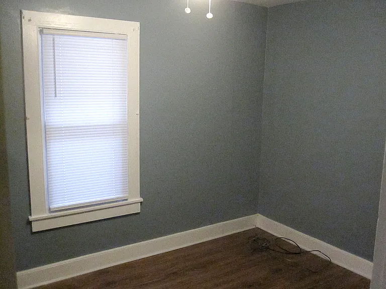 Middle bedroom, angle 2 of 2.