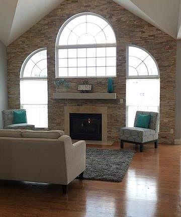 In-vaulted with wall of windows