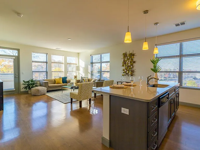 Dorothy penthouse kitchen island and living space