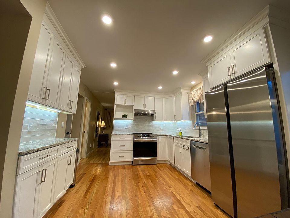 Kitchen, new flooring, new lighting, new appliances, new maple solid cabinets with beautiful crown molding, etc