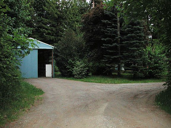 Separate shop driveway & parking 