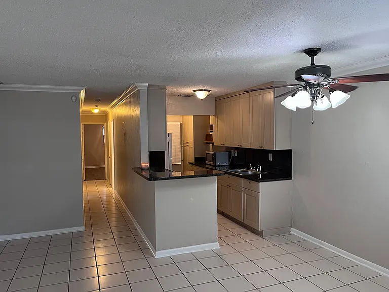 Family room, dinining room, kitchen and hallway view