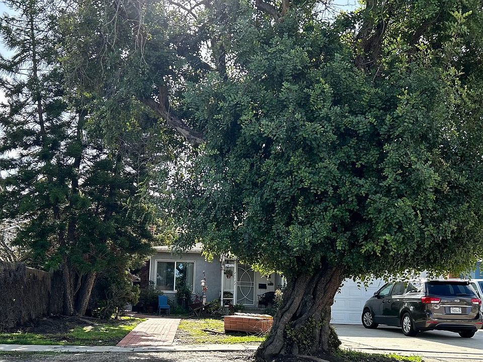 This is the front entrance to duplex. The brick path leads to a private entrance to the back unit which is up for rent.