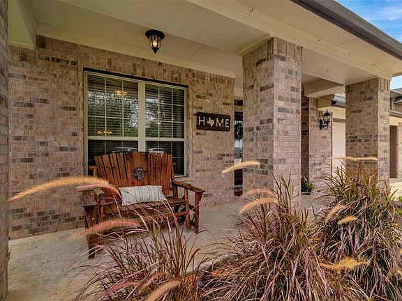 A front porch to enjoy the sunset and views of the golf course.