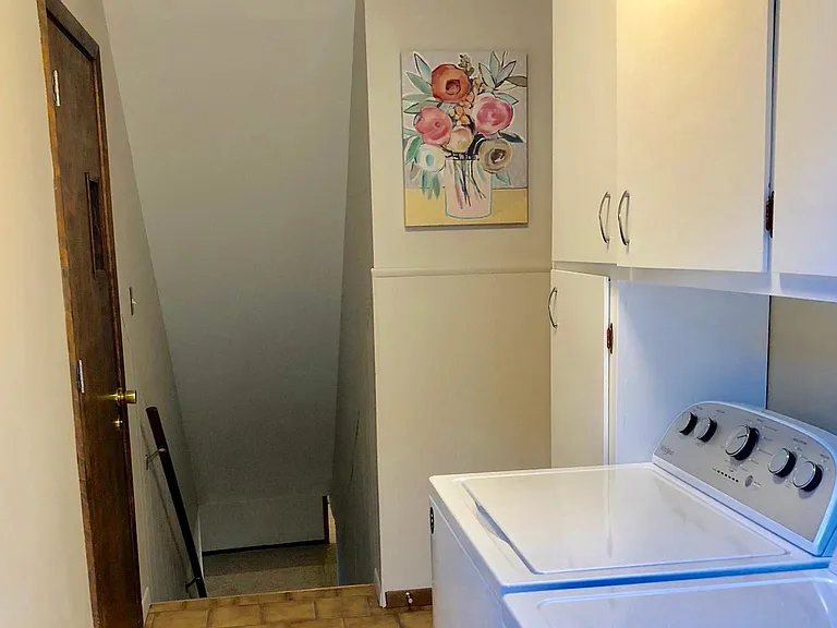 Shared laundry and entrance to unit