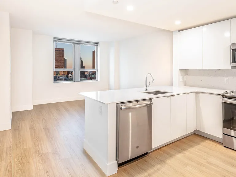 Kitchen and Living Room with Hardwood Flooring
