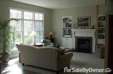 Living Room
						:
						Comfortable room w/ fireplace and view of the woods and creek below.