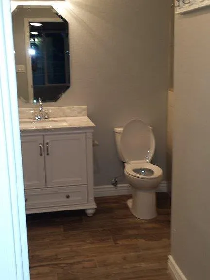 Bathroom near front door also attached to 2nd Primary Bedroom w/ Jack & Jill doors so it can be used for private access or shared