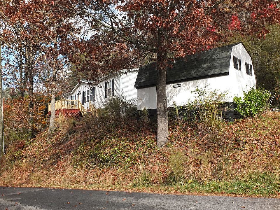 Home, deck, and outbuilding