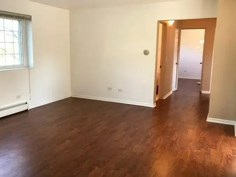 Hallway entrance to bathroom and bedrooms.