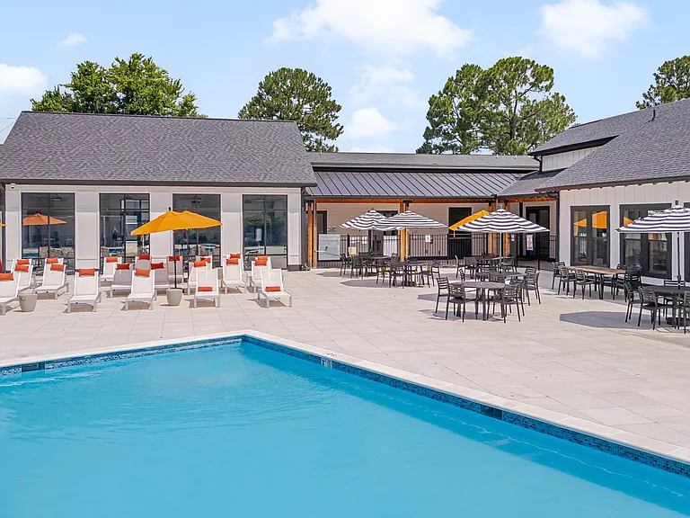 Dive into luxury living at Crossings @ 501 Apartments. Relax by our sparkling pool surrounded by stylish lounge areas and vibrant sunshades. Ideal for socializing or unwinding. Schedule a tour today and envision your new lifestyle!