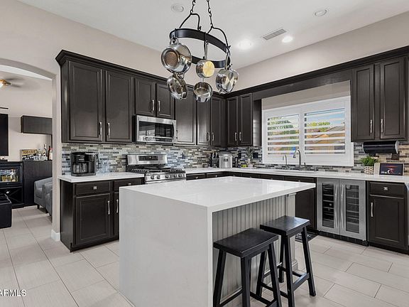 2nd image of 10464 E MEDINA Avenue