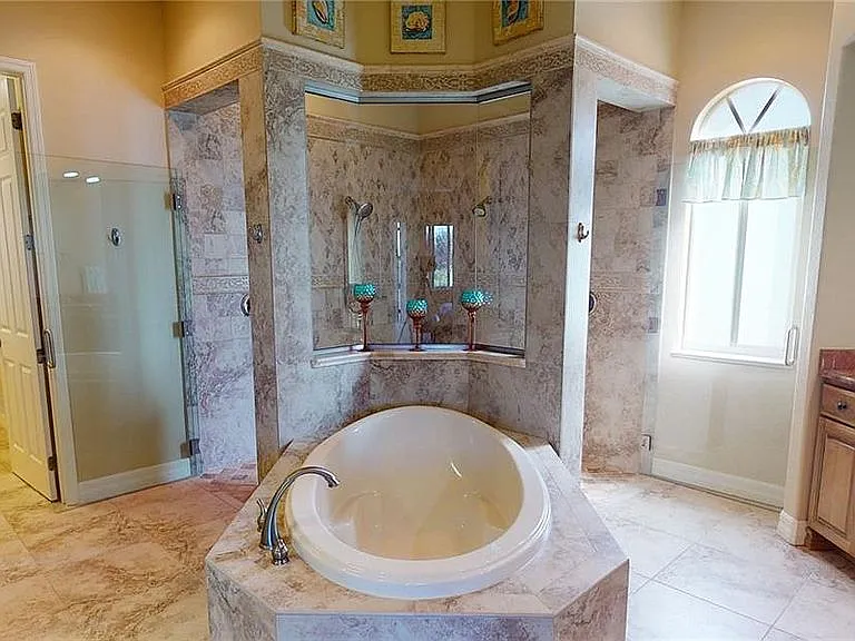 Master bath w two large walk in closets