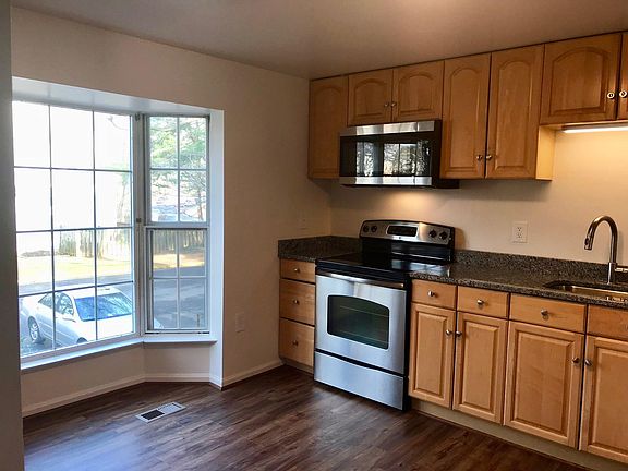updated kitchen - luxury vinyl planking, granite, stainless 