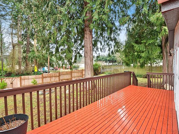 3rd image of 6993 NE Whispering Cedar Ln