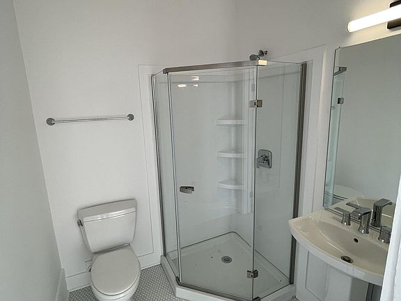 Full bathroom 1 attached to bedroom one.