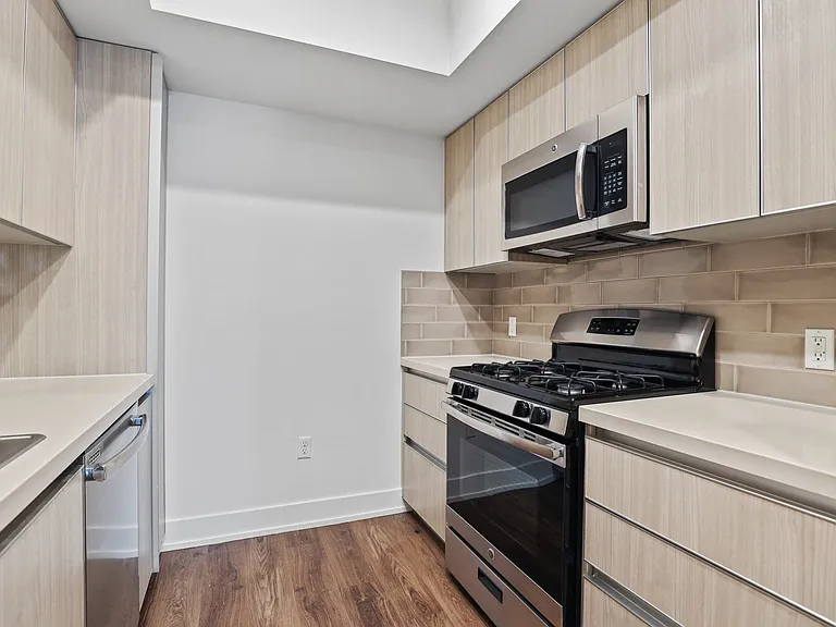 Kitchen with Stainless Steel Stove, Microwave Oven, and Dishwasher