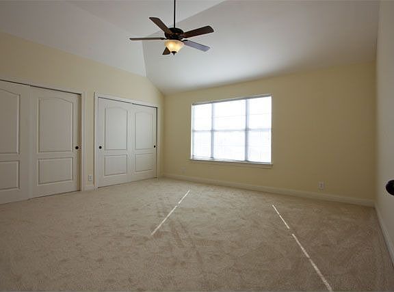 Master Suite with volume ceilings