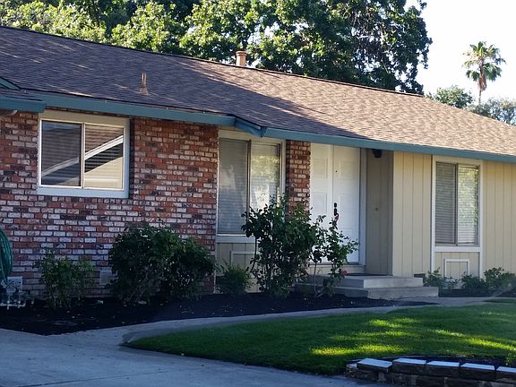 house with attached garage, new landscaping