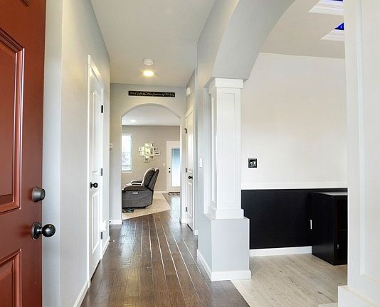 Beautiful engineered wood flooring plus archways and designer paint schemes. 9 foot ceiling thru out home.