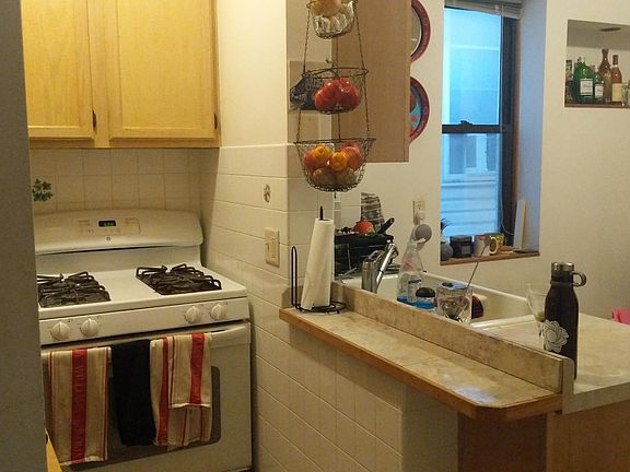 pantry/cooking area looking out onto kitchen