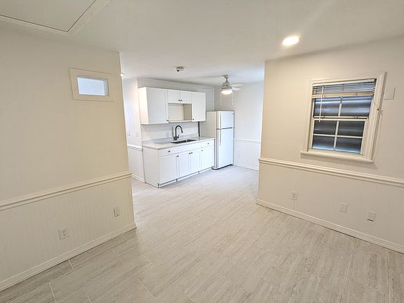 Facing kitchen from living room