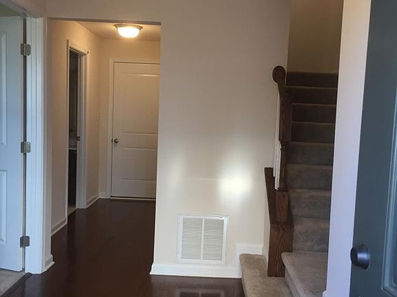 2 first floor entrances from garage and front , home office-4th bedroom with full bath