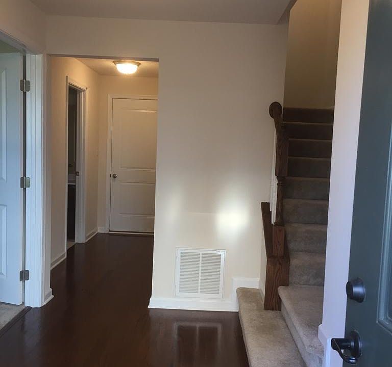 2 first floor entrances from garage and front , home office-4th bedroom with full bath