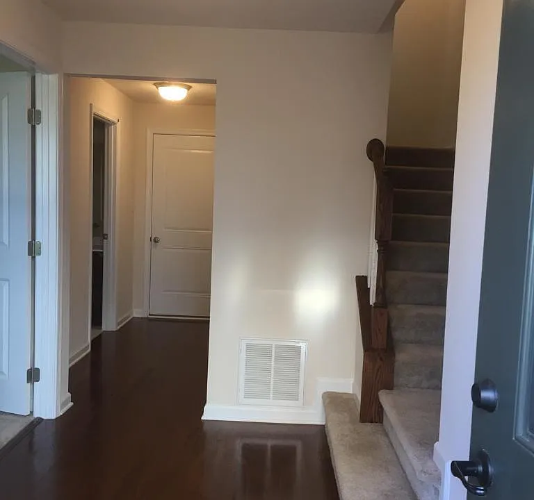 2 first floor entrances from garage and front , home office-4th bedroom with full bath
