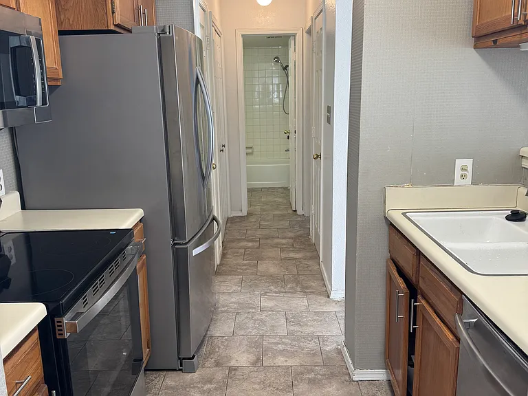 1802 E 66th Pl #F212 — Photo 1