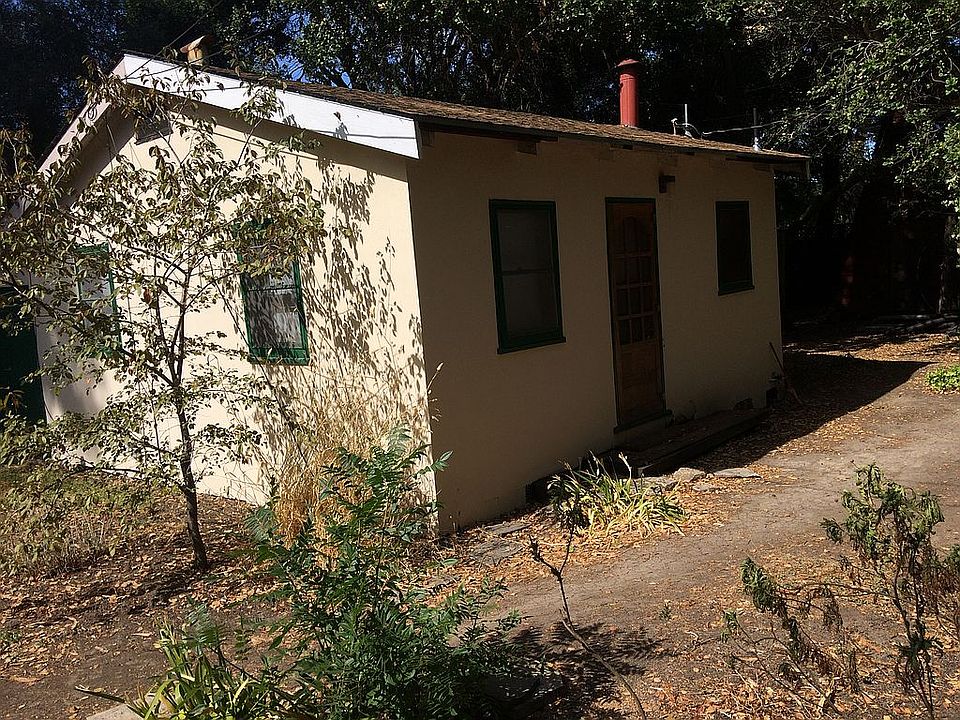 Front of cottage faces south