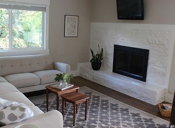 Another look at the living room, this offers a closer look at the fireplace.