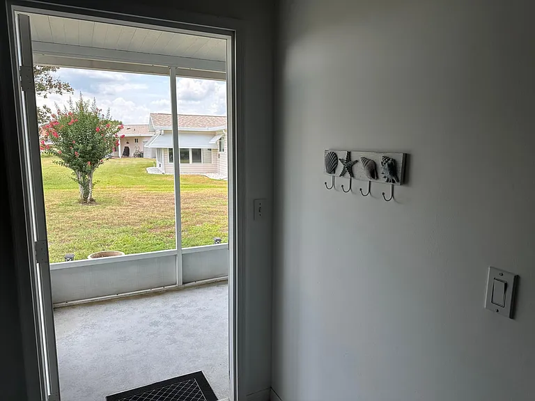 Door to the outside Lanai from the Garage