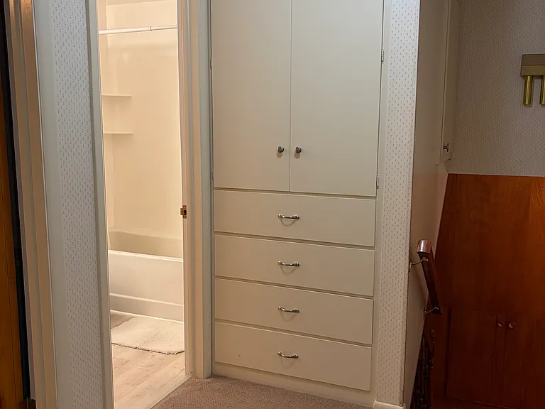 Hallway at the top of stairs, Master BD door is on the left