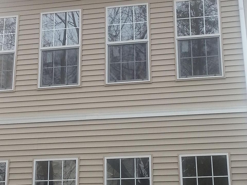 back of the house, enclosed porches