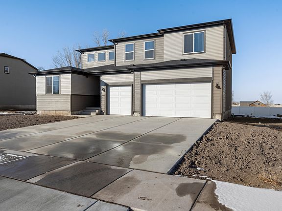 The Logan floorplan exterior image taken at a Meritage Homes Community in Grantsville, UT.