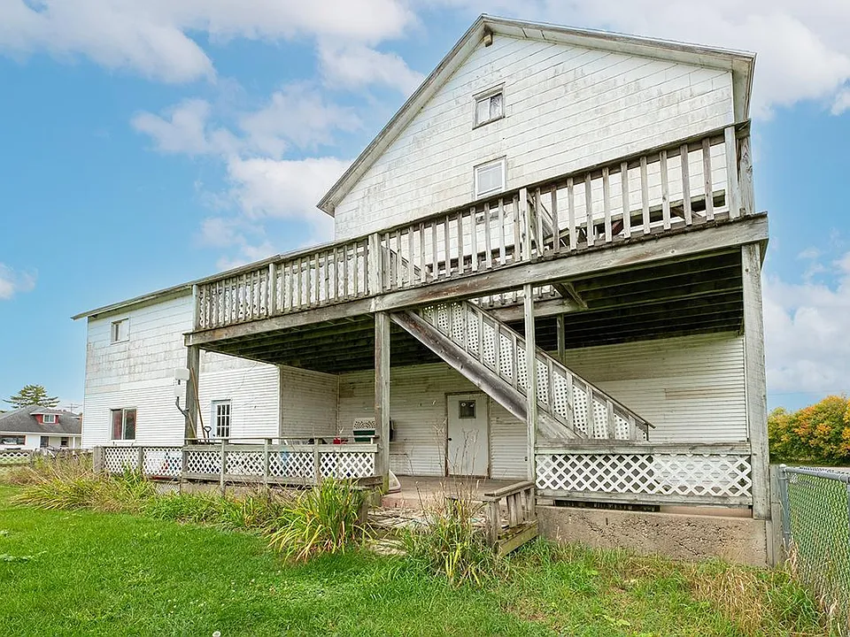 Rear exit to fenced in back yard