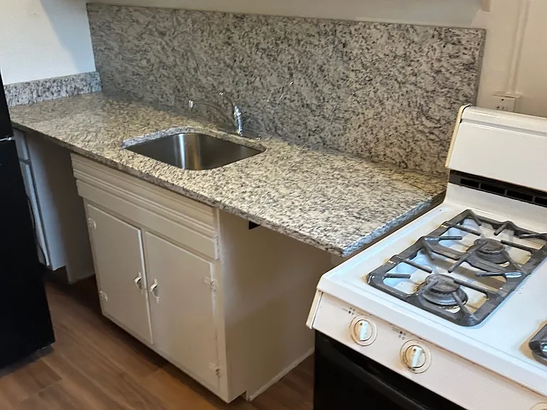 new granite countertops, sink and faucet