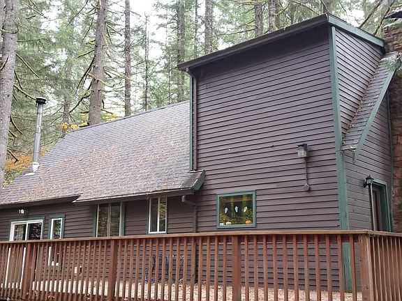 The backside of the house with a huge deck! - Summer Time