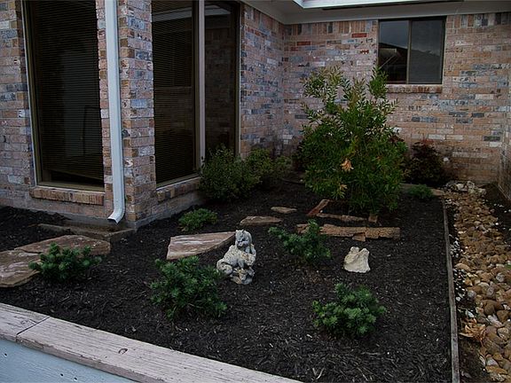 Nicely landscaped front entrance