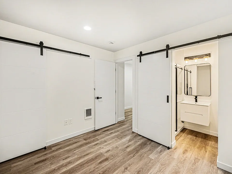 Entry level guest bedroom with ensuite bath.